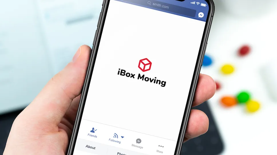 Mobile phone with moving service booking form for iBox Moving Los Angeles